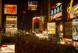 natgeofound:  Crowds engulf Broadway on New Year’s Eve, January 1964.Photograph by George F. Mobley, National Geographic