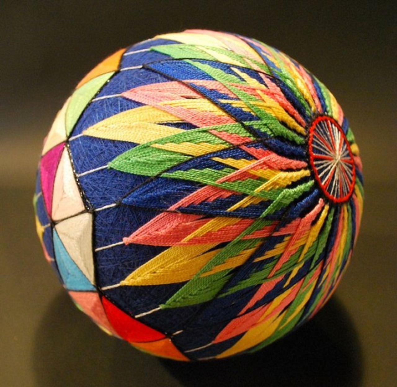 asylum-art:  A Huge Collection of Embroidered silk  Spheres by  92-year-old grandmother