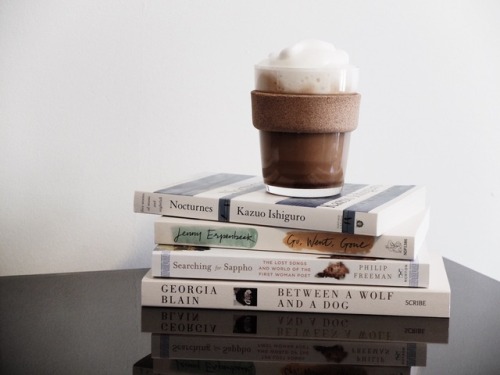 delthenerd:pretty white books & a foamy latte.