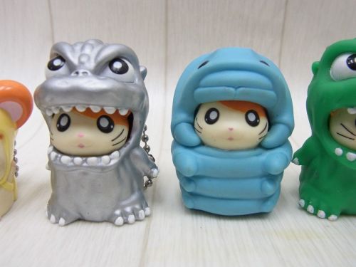 astoundingbeyondbelief:  Some toys from that odd three-year period where Toho released Godzilla and Hamtaro movies as double features. Photos from eBay. 