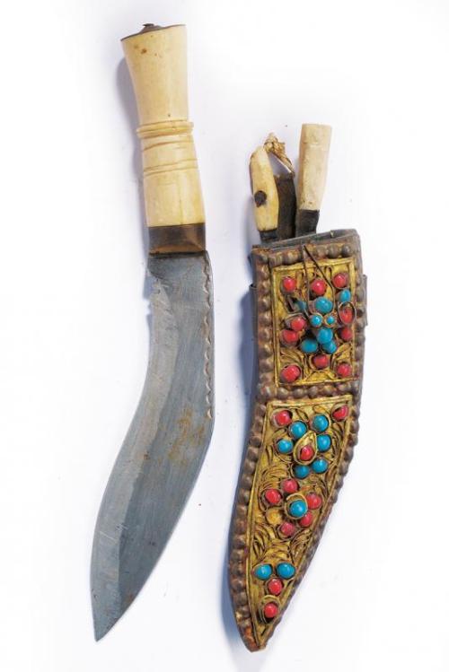 Kukri dagger with sheath decorated with colored pearls, India, 20th century.from Czerny’s Internatio