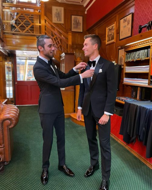 The groom and his best man, happy with their final fittings. Both black tuxedos using formal wear cl