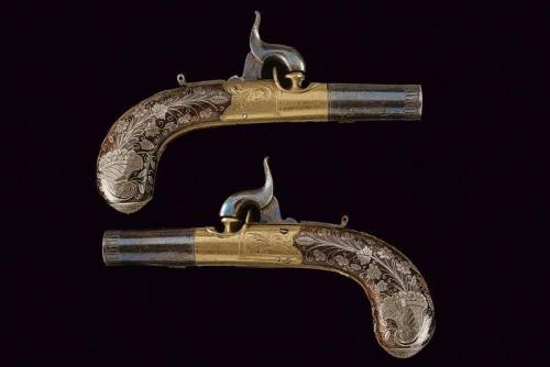 Percussion pocket pistol with silver inlaid grips, crafted by E.W. Bond of London, mid 19th centuryf