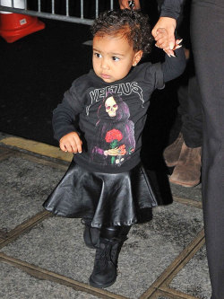 peoplemag:  Aww! Kim and Kanye&rsquo;s little lady North West rocks Paris Fashion Week with an adorable leather skirt (from her mom’s Kardashian Kids line, of course!) and Dad’s Yeezus tee. 