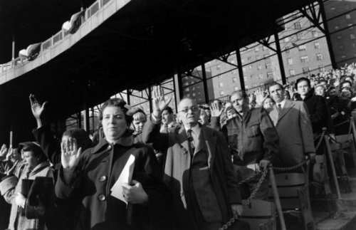 On the first Veterans&rsquo; Day, 50,000 immigrants were sworn in asAmerican citizens in mass ce