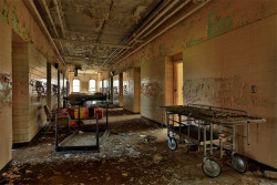  Corridor at Bryce State Hospital, a Kirkbride Plan asylum down in Tuscaloosa, AL.  When this building was abandoned, a lot of artifacts were abandoned with it; gurneys and furniture fill some of the hallways, and there are offices that are basically