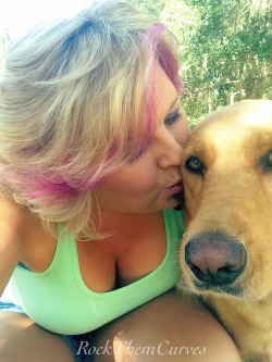 rockthemcurves:  Just a quick hello to everyone… It’s a lovely day out.. This is my dog. I didn’t realize she was licking her lips lol. Cleavage and pup!!  Very beautiful