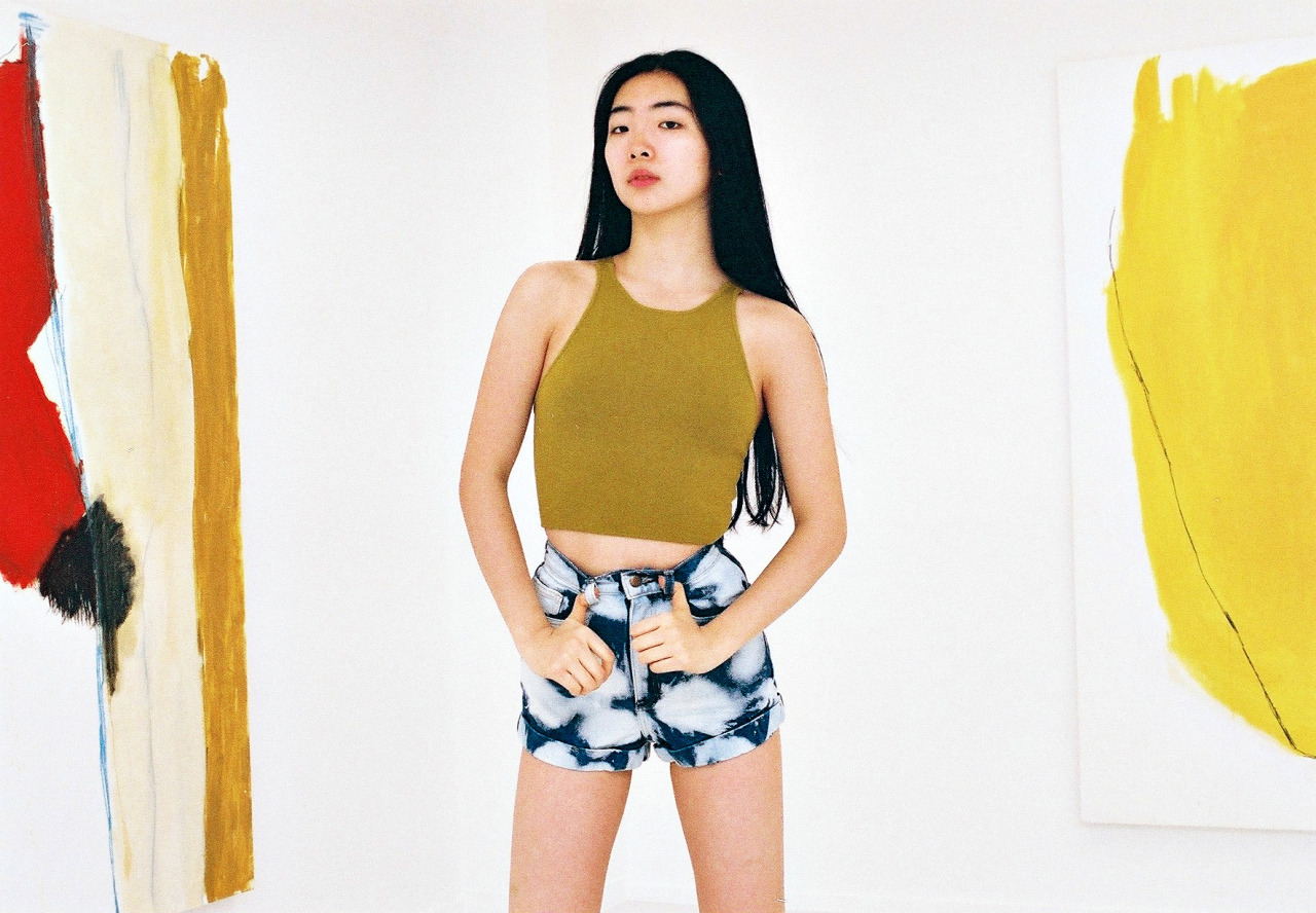americanapparel:  Yuri wears the V Strap Tank &amp; Dark Wash Indigo Clouds Denim