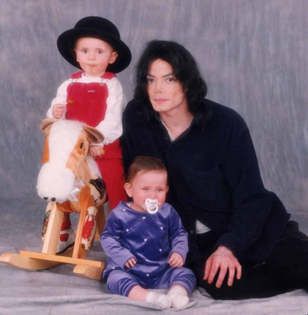 Michael Jackson with his children Michael Jr (known as Prince) and Paris- Michael in 1999. Photos by Hamid Moslehi – @twixnmix on Tumblr