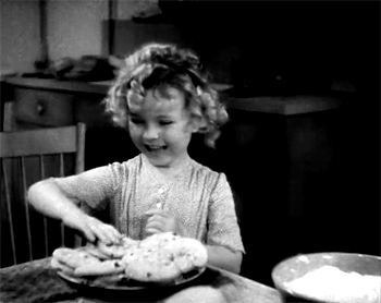 oldhollywoodfilms:Shirley Temple stealing cookies.