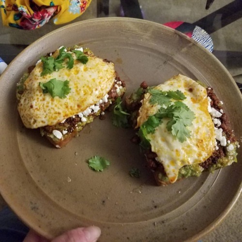 Avocado toast with chorizo, goat cheese, and fried egg. Yummy! #dinner #avocadotoasthttps://www.in