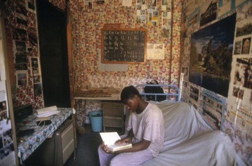 faintquiverings:A student studies in his dorm room at Al-Azhar University, Cairo, Egypt, in 1997. Ph