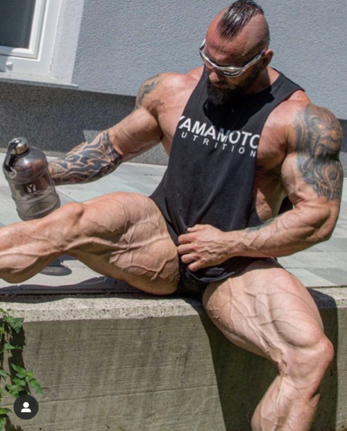muscleobsessive:Ultimate muscle daddy Miha Zupan spreading his gigantic quads like the shameless fre