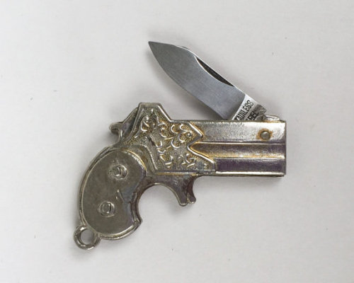 thegolddig:Gun shaped Knife Pendant(more information, more etsy gold)