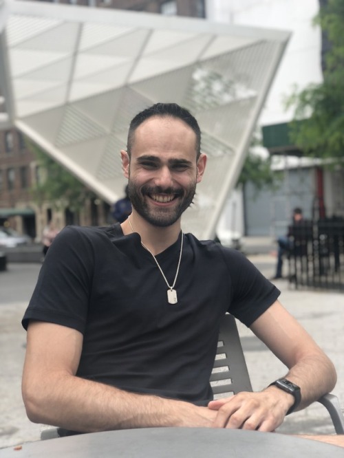 tj-593:  My friend took these photos of me cracking up in real time as he was making a joke about hot leather daddies as a couple of leather daddies passed by our table in the park. Also, look how horrible of a job portrait mode did here.