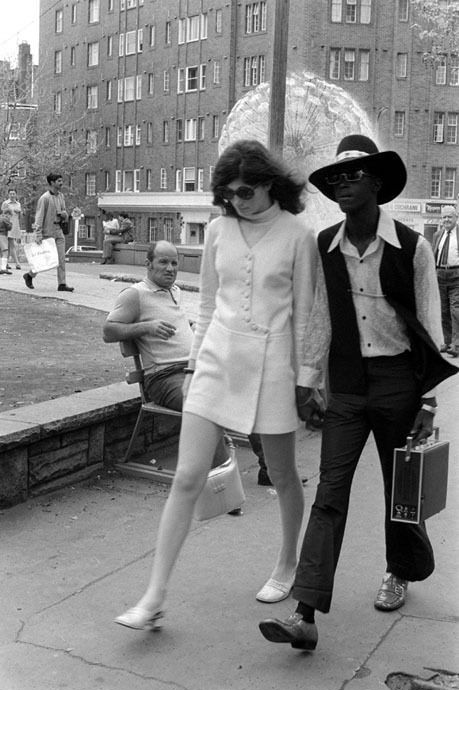 Interracial couple in the 1960s. The disapproving man behind is an example of the unfortunate cultur