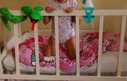 littleminxy3:  So happy and comfy in this cot!! The mobile was