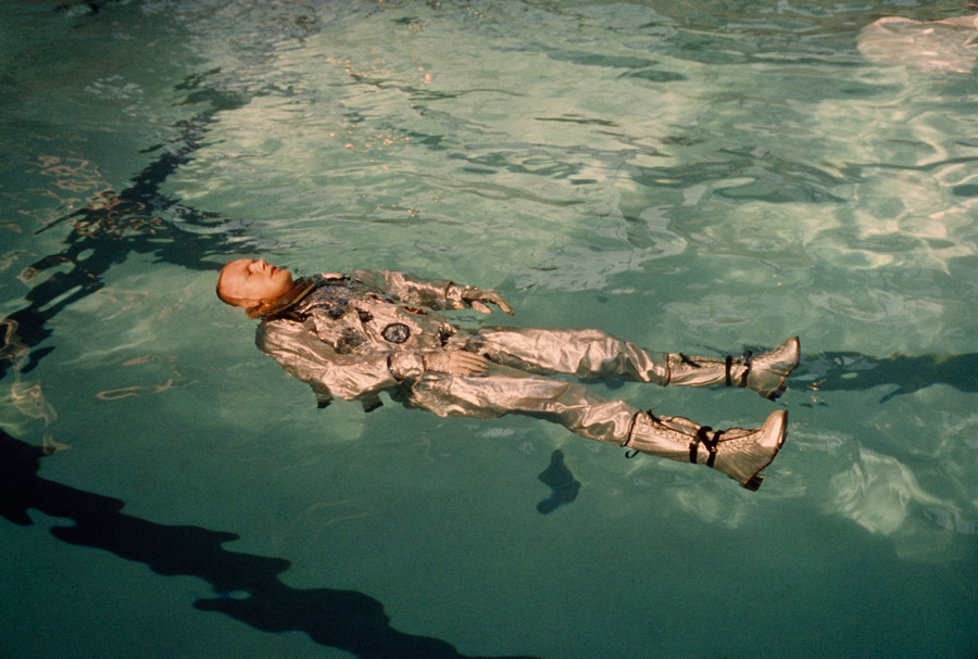 natgeofound:Astronaut Neil Armstrong floats in his space suit in a pool of water