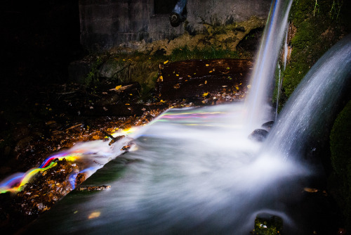 fromthelenzmedia:  Neon Falls. Light trails of glowsticks shown through the movement of the water. 