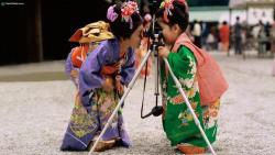 Shichi-Go-San is the Japanese festival for children ages 7, 5, and 3. Children those ages will dress up in traditional kimono and visit a shrine. This photo was taken at one of those shrines.