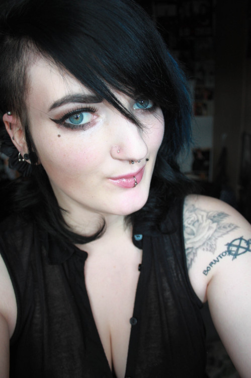 twisted-freakshow:  This dot under my eye.. I’m forever drawing it on.. perhaps I should just get it tattooed the next time I’m under the needle?