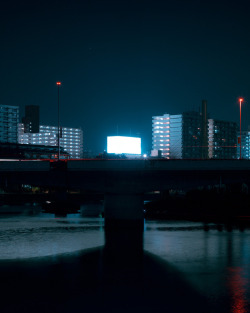 cbje-tokyo:  Wandering along the edge of a river late at night looking for the light. #DERIVE Photography by Cody Ellingham 