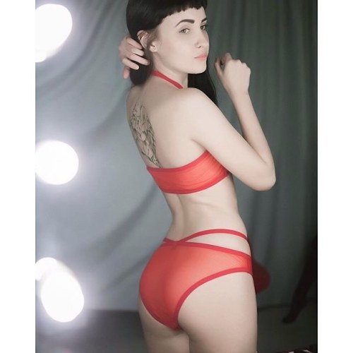 Red #SinnerCouture lingerie looks so good with pale skin and black hair!  Classic beauty @holly_pand