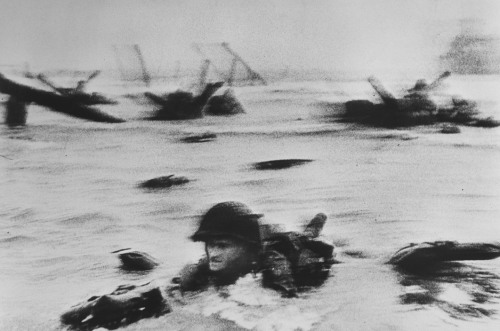 FRANCE. Off the coast of Normandy. June 6th, 1944. American troops transfer from troop ships to land