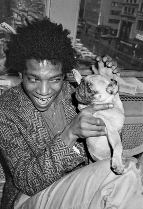 twixnmix:Jean-Michel Basquiat with a pug at Andy Warhol’s studio, 1984.Photos by