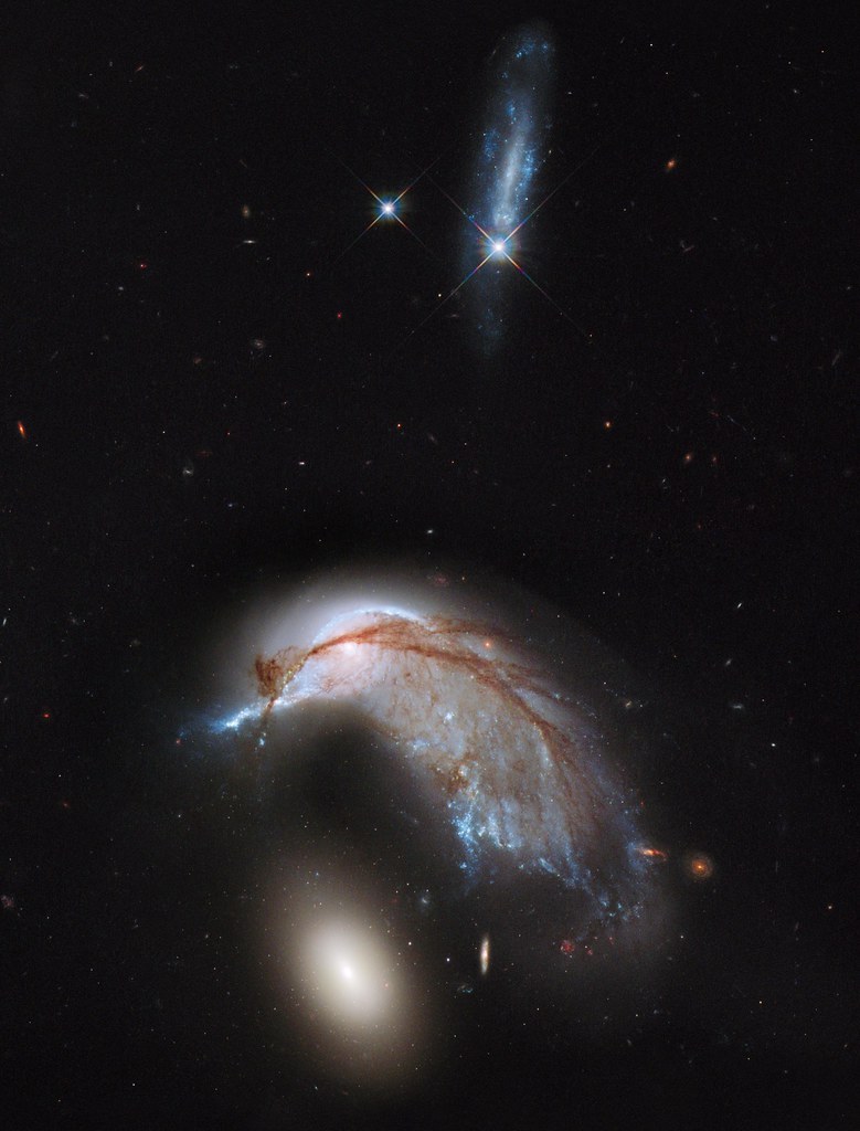 Interacting Galaxy Duo Arp 142 by NASA Hubble