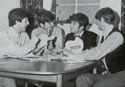 The Beatles reading fan mail, Green Street, London, 9 October 1963. Photo © The Beatles Book.&l