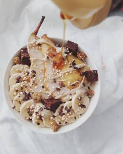 pearsnpancakes: morning , how are you guys this fine winter morning ? 😋🍵 a steaming bowl with vanilla chai oats plus my most favorite toppings ever (pear , banana , cashew butter , quinoa pops , cacao bean nibs , white mulberries , @pulsinandbeond