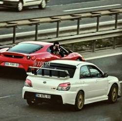 Toyota-Senpai:  Hood-Skoop:  Wait…  Ferrari People Photographing An Sti? I Mean