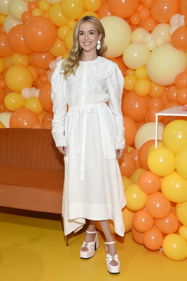 ZOEY DEUTCH at the Woodbridge Wine Soda Launch Event on August 12th 2022 wearing ULLA JOHNSON