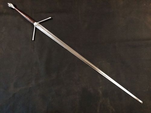 art-of-swords:  Handmade Swords - Celtic Longsword Maker: Marco Danelli of Danelli Armouries Measurements: overall lenght: 133cm (52”). Guard width: 25cm (10). Blade lenght: 104cm (41”). Blade width: 4cm (1-3”). Grip+pomel lenght: 30cm (12”).