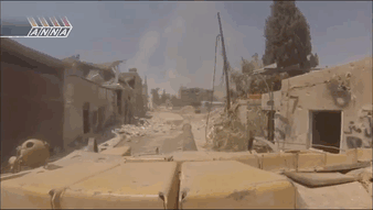 celer-et-audax:  A Syrian Armoured Column of MBTs and IFVs as they drop troops near