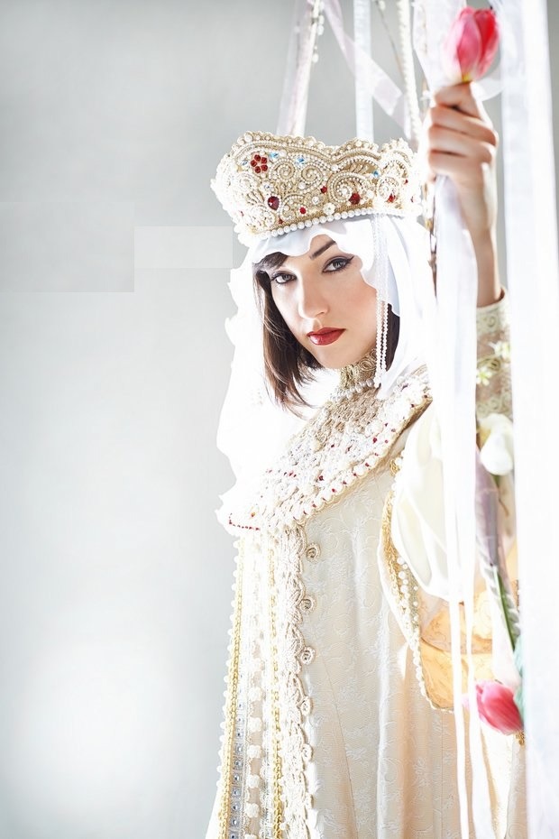 sensualspectrum:  Sasha Grey on a swing in a traditional Russian kokoshnik and costume