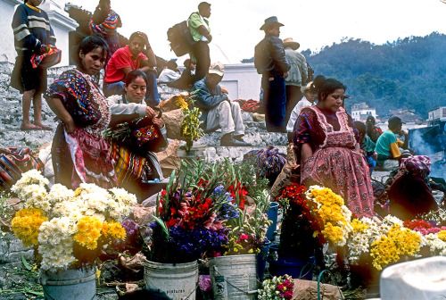 Flower sellers on the step of the cathedral in Chichicastenango Guatemala - flm scan from 2004