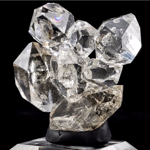 mineraliety: Beautiful Herkimer Diamond cluster via @greenstone_fine_mineralia - notice the rainbow?