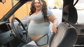 After a big stuffing, she can’t even fit in her car!