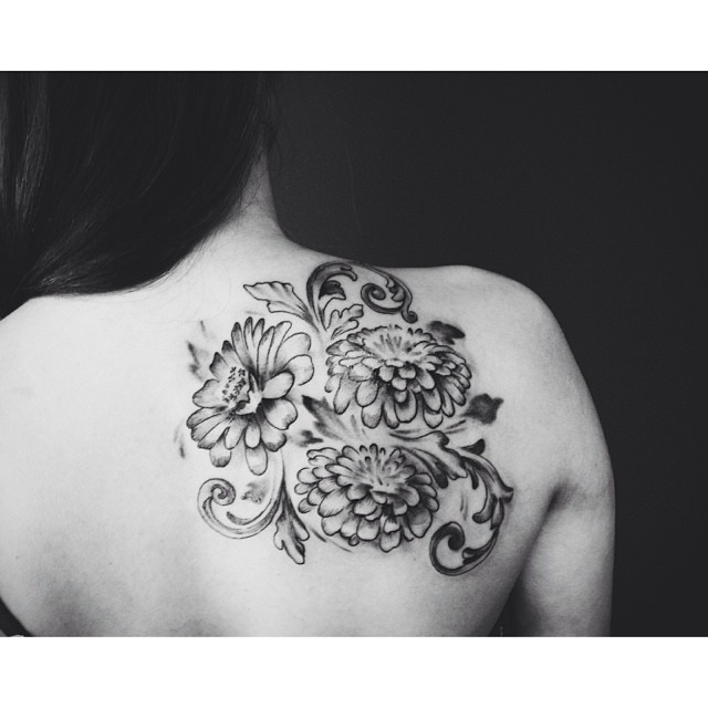 fuckyeahtattoos:  Zinnias  By John Kosco @ Sacred Souls Ink. 
