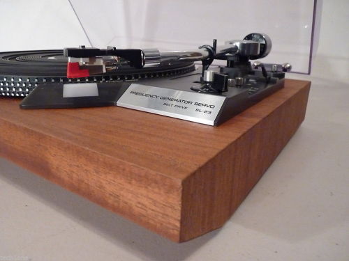 Technics SL-23 - Restored One Of A Kind Auto Return Turntable.   A true classic one of a kind turntable by Technics, model SL-23. The turntable has been restored to better than original condition. The base had the gray vinyl covering removed and real