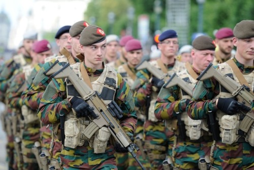 members of the paracomando’s parade on twenty first of july in brusselsbelgium