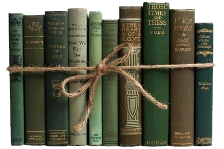 Image of books in various shades of green tied together with twine.
