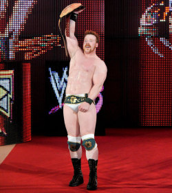 fishbulbsuplex:  World Heavyweight Champion Sheamus  Sheamus wearing white trunks, covered in sweat while holding the World Heavyweight Championship! This pic is perfect!!! *.*