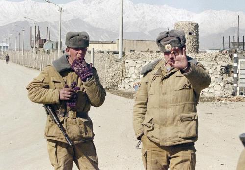 soldiers-of-war:AFGHANISTAN. Kabul Province. Kabul. February 10, 1989. A Soviet soldier smokes a cig