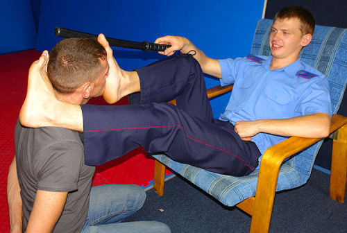humiliationverbale:  sub knows ts place and duties on the feet of this young Superior with amazing hot soles 