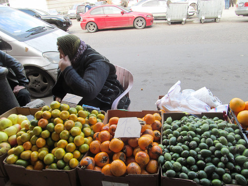 Babushka in Tbilisi selling fruit (I haven’t tried the green things, I actually have no idea what th