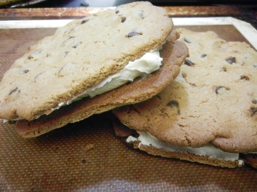 thatblackveganguy:  diezo:  Vegan double-fucking-decker-frosted chocolate chip cookies. Get out of my face forever. Warning: Bring your favorite stuffed doll and blankie, cuz you going conk out after this.  Woah… Just.. wait a minute… I need these