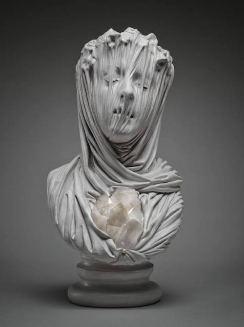 asylum-art:  The Veiled Ghosts of  Livio Scarpella The work of Italian contemporary artist Livio Scarpella turns good and evil into delicacy.  This group of sculptures, named “Ghosts Underground”, depicts lost souls anguishing beneath the effect